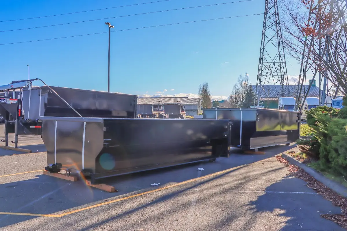Roll-off dumpster ready for waste disposal at job site for Yard Waste Dumpster Rental in Chehalis